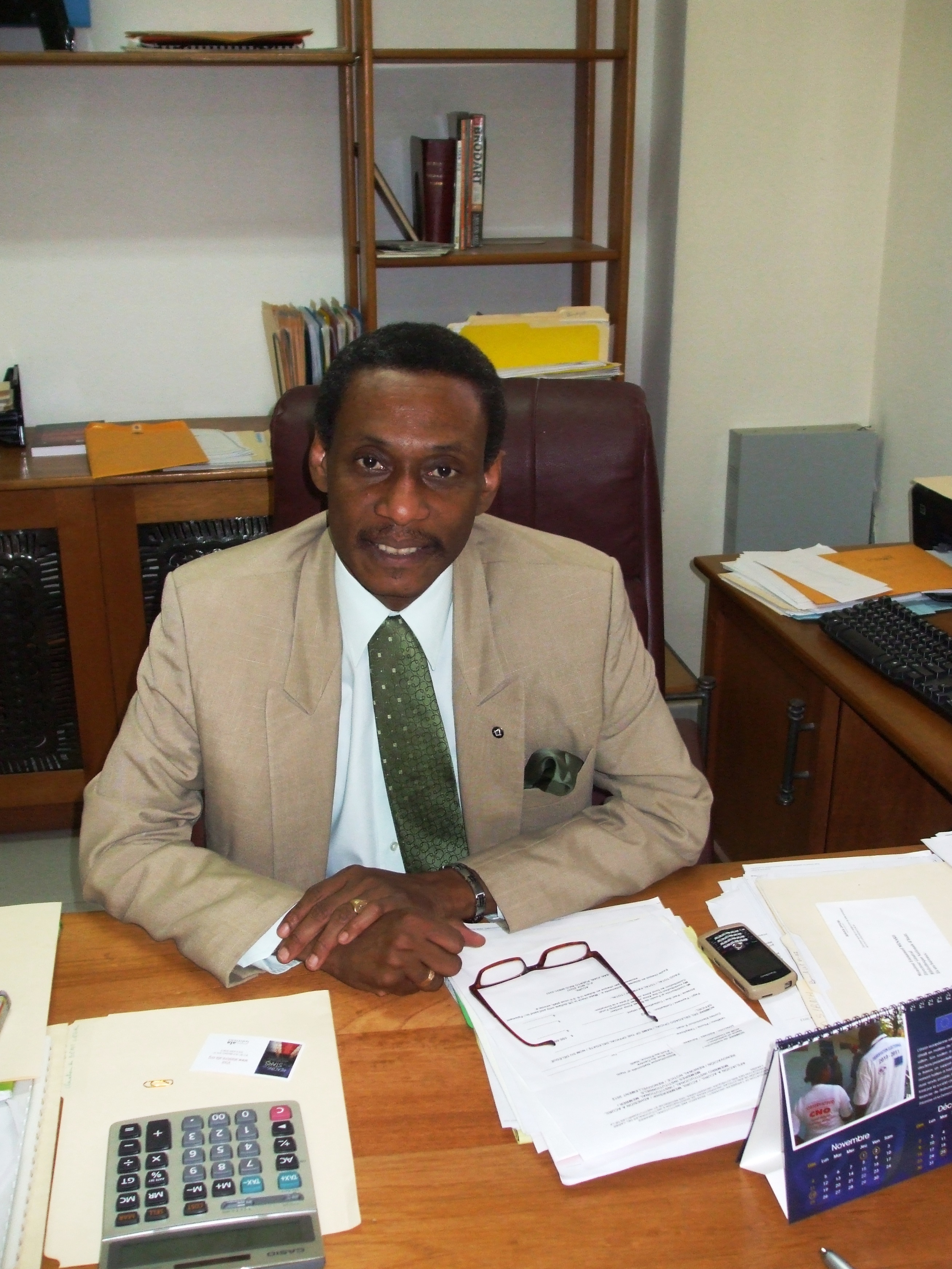 Bibliothèque Nationale Director General Emmanuel Menard oversees library affairs from his office in Port-au-Prince.
