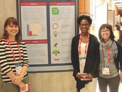 (From left) Glenda Insua, Mireille Djenno, Annie Pho of University of Illinois at Chicago library present a poster at WLIC 2014.