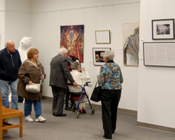 Attendees at the State Library of Ohio's "Parallel Arts-Women Create" exhibit.